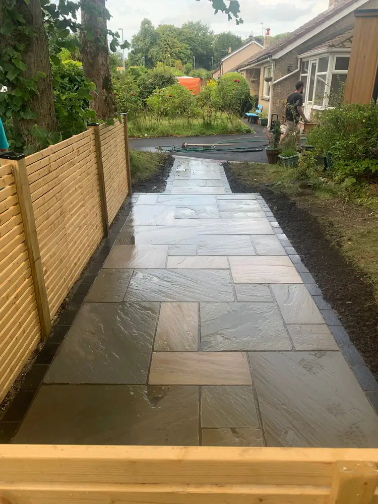 Landscaping with sandstone and fencing