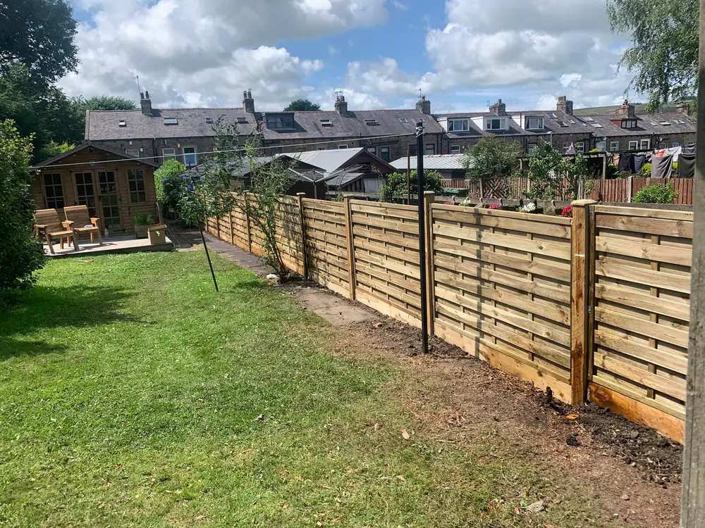 Wooden slatted garden fence